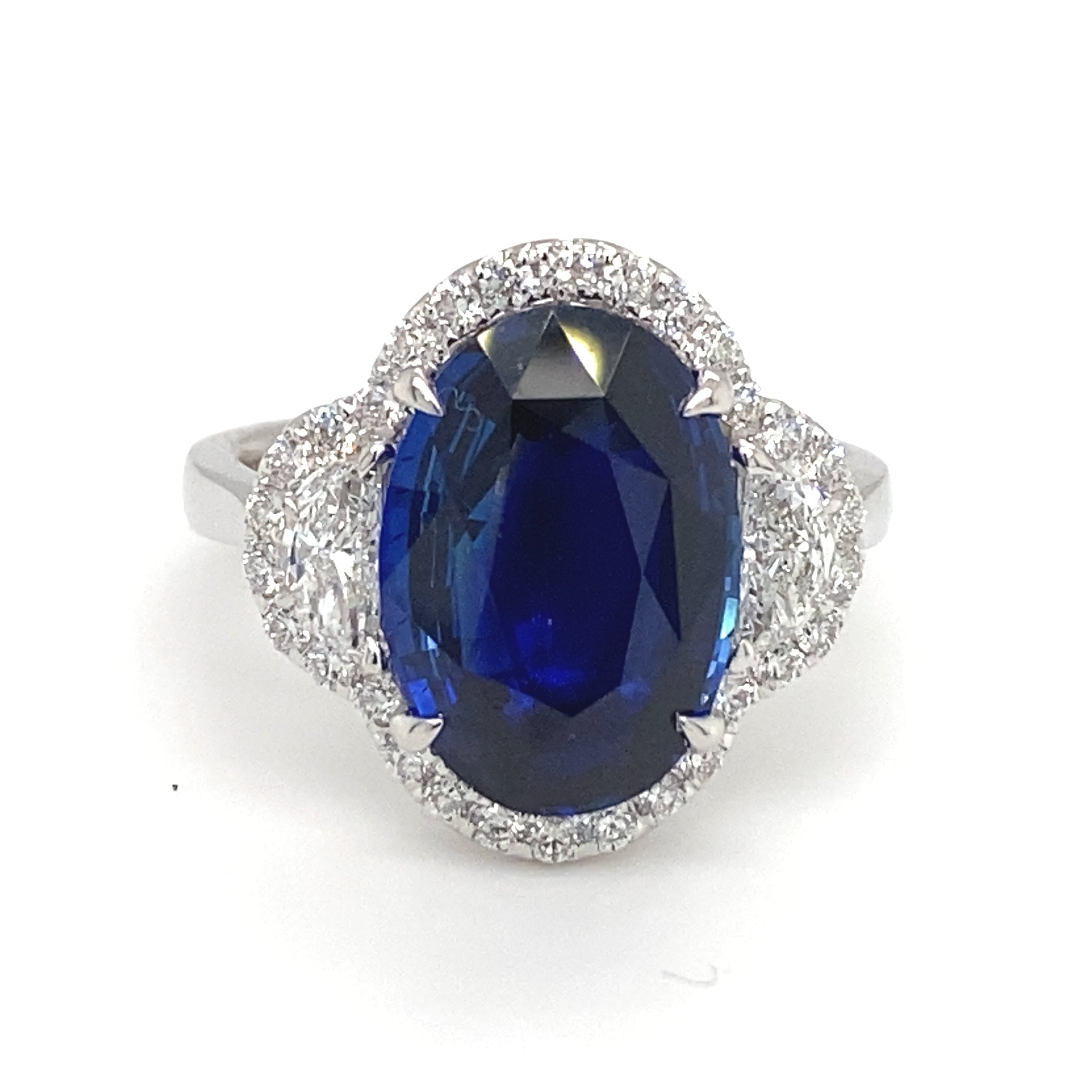 Oval Ceylon Sapphire And Moon Shaped Diamond Ring